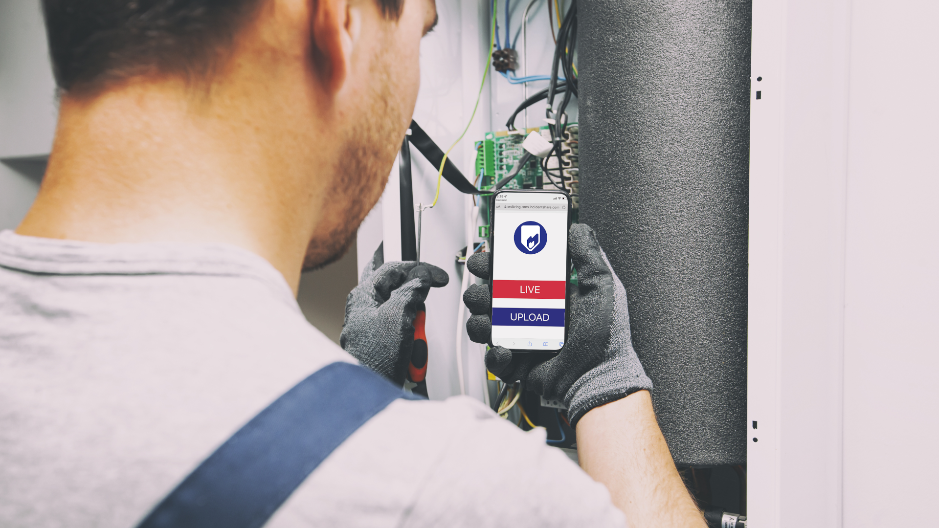 industry man with phone 1920x1080